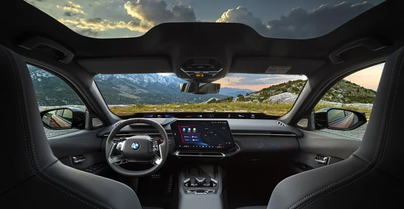 L'habitacle de la BMW Série 3 2027 s'articule autour du Panoramic iDrive et d'un écran central de 17,9 pouces